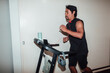 © Anthony Mujica Viera - Man jogs on treadmill indoors