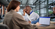 © Andrey Popov - An Injury Lawyer Carefully Helps A Worried Worker Manage Accident Claims