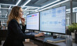© Andrey Popov - Woman Edits Business Process Diagram On Computer