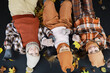 © alexkich - Happy Kids in Cozy Autumn Attire Lying on Leaves