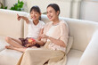 © Blue Jean Images - Mum hanging out with her daughter at home