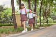 © Blue Jean Images - Two happy girls after school