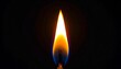 © Rahmat  - Beautiful macro view of a single burning candle flame glowing intensely in the dark with bright yellow orange and blue colors for meditation