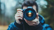 © aiman - man taking photo with camera lens front view outdoor portrait style