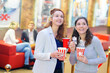 © auremar - two beautiful young girls in the cinema