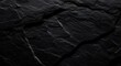 © Oriel-team - A high resolution close up view of the rough and dark textured surface of natural black slate rock