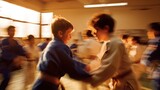 Children practicing judo in blurred gymnasium martial arts class