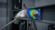 © Chopang.studio - Metal stress test on steel structure with colorful strain distribution showing tension and pressure in industrial setting