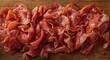 © VRVisionary - Handpicked prosciutto slices arranged on a vintage wood serving board