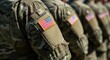 © Smartra - American soldiers wearing camouflage uniforms with usa flags on sleeves