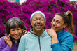 © Sabrina - Happy elderly female friends having fun together at city park - Multiracial women, lifestyle and happiness concept