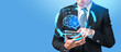 © ImageFlow - A business person holding a tablet with a glowing brain hologram in futuristic graphic style on a blue background, concept of innovation and technology