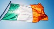 © sergiokat - Ireland Flag Waving Against Sunny Blue Sky