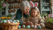 © AnastasiiaAkh - Grandmother and granddaughter decorating easter eggs together family spring holiday tradition at home