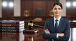 © Thai - Immigration attorney and family civil law litigation concept featuring a wooden judge gavel atop leather bound legal books within a courtroom or office setting for justice and migration rights.