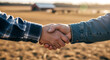 © Diki - farmers shaking hands to seal a business deal in a sunny agricultural field symbolizing trust and partnership