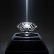 © Safa - Brilliant cut gemstone receives intense focused light beam while resting upon dark display stand