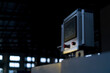 © zhu difeng - Close-up of an industrial control panel with display screen and operational buttons