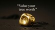 © HafizRashid - A single pure gold nugget resting on a dark textured surface