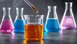 © wanna - A scientific research laboratory featuring glass test tubes and a beaker filled with colorful liquid for chemistry analysis and medical experiments