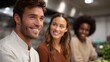 © Bussakon - A diverse group of friends smiles warmly while interacting in a bright kitchen environment highlighting connection and shared moments