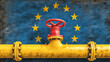 © Anoo - European flag waves in the background while a yellow gas pipeline with a red flow control valve is showcased prominently representing energy resources