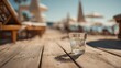 © Erwin - Glass of Refreshing Water on a Sun-Drenched Wooden Boardwalk at a Beach Resort.