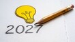 © DWI - New Year 2027 Ideas and Planning with Lightbulb and Pencil.