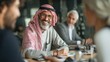 © sup - Smiling arab man in meeting