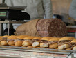 © manola72 - Tasty sandwiches with porchetta at market