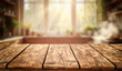 © magdal3na - Empty wooden kitchen table with copy space for product placement, set in a bright and sunlit interior. Warm sunlight coming through the window, cozy and inviting atmosphere.