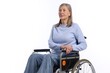 © New Africa - Senior woman in wheelchair on white background