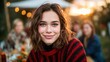 © svastix - A cheerful young woman with a bright smile, captured during a lively outdoor gathering at sunset, surrounded by warm lights and a joyful atmosphere perfect for socializing.