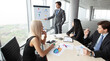 © alotofpeople - Business people meeting in office desk board