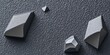 © antishock - Gray acoustic foam pieces arranged on textured dark surface. Geometric shapes absorb sound, improve studio quality.