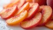 © Pete - Sliced ripe peaches with water drops on white surface. Juicy fresh summer fruit slices with red and orange colors. Healthy food texture, nature sweetness.
