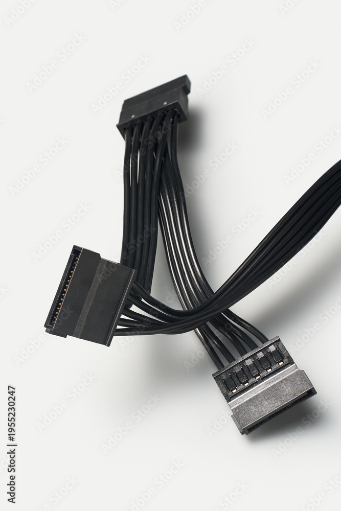 3 black sata power supply connectors with flat ribbon cables isolated ...