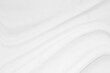 © niwat - white cloth background soft wrinkled fabric patrem and surface