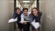 © Bernd Schmidt - Three adults in a hallway lean forward to launch paper planes with joyful competitive expressions in a professional office environment generative AI