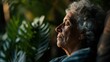 © Larisa AI - A serene elderly woman is seen with her eyes closed, immersed in tranquility amidst lush greenery, radiating a sense of calm and connection with nature at dusk.