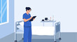 © FARIDA - Nurse in blue uniform writing on clipboard next to hospital bed and medical equipment