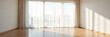 © AlenaSi - Bright empty room with large windows and wooden flooring revealing modern interior design. Spacious empty room showcases natural light filtering through sheer curtains creating warm ambiance.