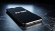 © photo for everything - Modern smartphone displaying 'BUY NOW!' text on screen against a dark, reflective marble surface, highlighting instant online purchase concept