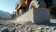 © Maryna - Heavy machinery moves concrete blocks in industrial quarry. Construction materials made with eco friendly tech near mountains. Future building industry development.