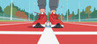 © hakule - Running on a track in red shoes with green trees and blue sky in the background during daytime at a sports venue