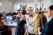 © Davor - Fashion designers reviewing blouse on mannequin in modern office