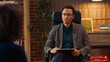 © DC Studio - African american counselor listening to couple at therapy session, trying to solve marriage problems. Doing psychotherapy appointment with married people, giving counseling help.