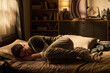 © Mediaphotos - Young man lying curled up on bed facing window, resting head on pillow with eyes closed, appearing to be sleeping or napping in softly lit bedroom interior