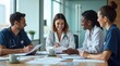 © Nathan - Healthcare Professionals Collaborating During Team Meeting in Modern Office Environment