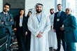 © oneinchpunch - Multiethnic business team participating in corporate meeting in dubai office